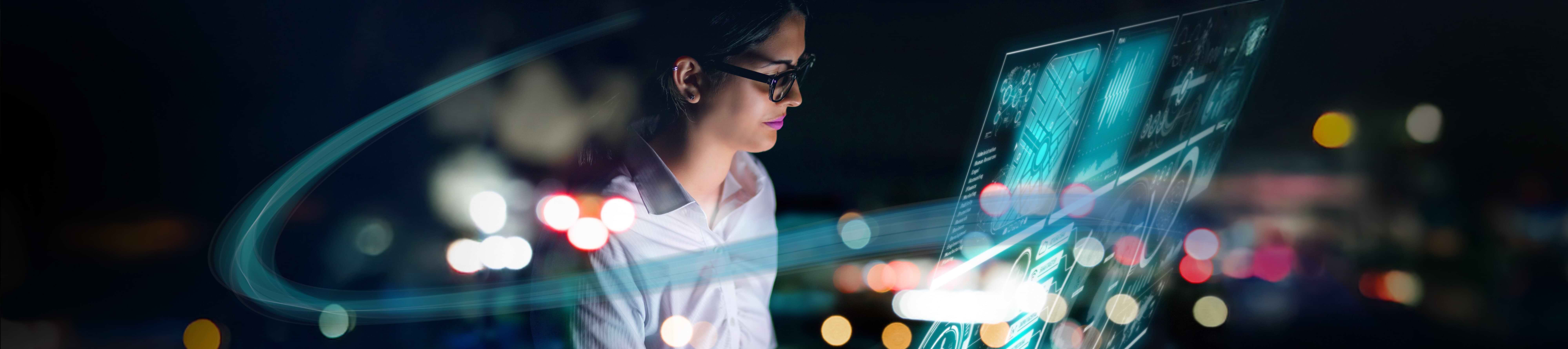 Woman in front of a computer screen